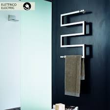 Towel rails and bathroom heaters designed to provide both heat and style in any interior. Chrome Electric Heated Towel Rails In Modern Design Snake By Scirocco Wet Rooms Modern Design Design