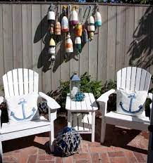 How to make a fishnet from twine to add coastal look to walls. Small Nautical Theme Cottage With Nantucket Flair Nautical Landscaping Nautical Patio Beach Decor
