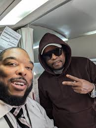 who is the other gentleman in the photo with the legend?