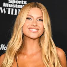 XANDRA Dazzles in Funky, Edgy Black Plunging Corset and Mini Skirt Combo in  Miami