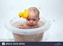 Non slip bathtub mat,extra long 36x17 inches rubber baby bath tub shower grey. Baby In Yellow Bath Tub With Sad Face Stock Photo Alamy