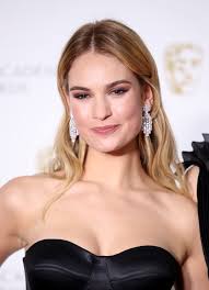 How old is Lily James and what's her net worth?