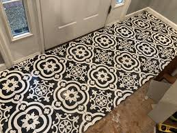 See more ideas about lowes tile, lowe's home improvement store, tile projects. Black And White Cement Tile From Lowes In Entryway How To Tile Tile Rug Cement Tile Flooring
