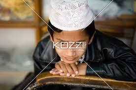 Little Boy With Cap A Little Boy With A White Cap Stares Into The Camera In Bangalore India Stock Photography Free White Caps Stock Photograph