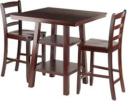 Get more storage and food prep surface area with one of their winsome kitchen carts, along with a baker's rack, buffet table, or microwave cart. Amazon Com Winsome Wood Orlando 3 Piece Set High Table 2 Shelves With 2 Ladder Back Stools Table Cha Counter Height Dining Sets Pub Table Sets High Table