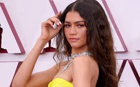 Zendaya (which means to give thanks in the language of shona) is an american actress and singer born in oakland, california. Zendaya Glows In A Neon Cutout Gown 6 Inch Platforms At 2021 Oscars Footwear News