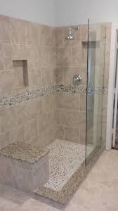 Stone brings peace, zen to your garden. Doorless Shower With River Rock Floor Rain Showerhead River Rock Deco Band Creates A Very Therap Bathroom Remodel Shower Half Bathroom Remodel Shower Remodel