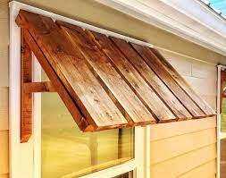 Rustic Home Decor Cedar Door And Window Awning In 2021 Outdoor Window Awnings Window Awnings Timber Frame Porch