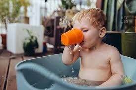 But this is pretty unlikely since most kids spit water out if it has that unpleasant soapy taste. Naked Blond Bath Stock Photos Offset