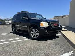 Image result for Superior Blue 2004 Envoy