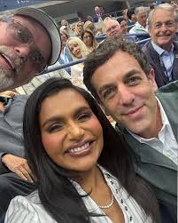 Mom & Dad at the US Open with a Rainn Wilson photobomb!