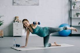 Fit woman doing front forward one leg step lunge exercises workout. 10 Best Prenatal Exercise Dvds 2021 Picks