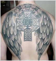 Large angel wings carrying the celtic cross carved on back. Celtic Cross Tattoos 3 Tattoo Ideas Center
