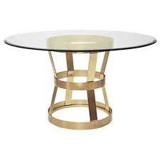 These pieces may feature wood or metal frames and a circular, square or rectangular surface. Worlds Away Dining Table Base In Antique Brass With 54 Glass Top Unlimited Furniture