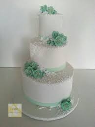 3 Tier Off White Wedding Cake With Vintage Feel Mint Green Roses And Piping Simple Wedding Cake Mint Wedding Cake White Wedding Cake