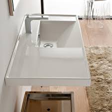 This wall mount bathroom vanity top is an elegant and modern sink with the unparalleled sophistication that will be an ideal addition to your current bathroom or bathroom remodel project. Scarabeo 3009 By Nameek S Ml Rectangular White Ceramic Drop In Or Wall Mounted Bathroom Sink Thebathoutlet