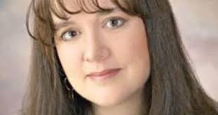 Local author has third book and seventh child