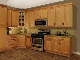 The kitchen cabinets are oak with regular light brown stain(maybe the wood is just sealed or something) where you can see the grain. How To Paint Oak Kitchen Cabinets With Many Veins Mile Sto Style Decorations