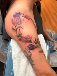 An upper arm floral vine wrap from today