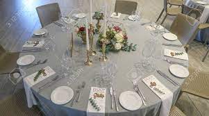 A fabulous way to give your long, narrow tables some dimension is to break them up with décor of different heights. Circle Silver And White Themed Wedding Reception Banquet Table Stock Photo Picture And Royalty Free Image Image 78810920