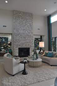For This Space The Focal Point Is The Fireplace It Is Tall And Bold Helping The Room Feel Taller It Also Has Living Room With Fireplace Home Fireplace Home