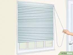 Visit your local home goods store for blackout blinds, which help prevent any light from entering the room. How To Block Sun From Windows 9 Steps With Pictures Wikihow