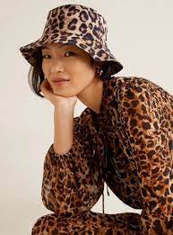 Trade In Your Berets And Biker Caps For The Official Hat Of Summer 2019 Accessory Hut Blog Leopard Bucket Hat Bucket Hat Women Outfits With Hats
