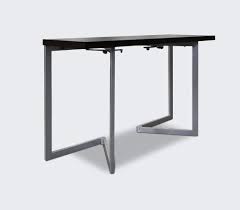 Fold folding and extending console table with textured top and modern geometric painted metal legs. Lyndon Convertible Console Dining Table Small Space Plus