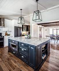 Technically you need to prepare white latex smother to acid the however, there are a lot of fans of distressed black kitchen cabinets. Classically Clean A Black White Kitchen Masterpiece E W Kitchens