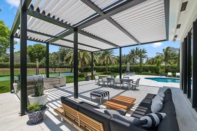 A sleek, modern aluminum pergola defining a luxury outdoor living space., AI generated