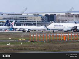 This premium economy class cabin doesn't seem very premium, does it? Boeing 747 800 Airbus Image Photo Free Trial Bigstock