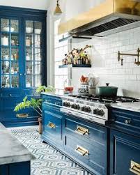 Brick makes the space industrial and very chic, it's almost an ideal decoration for kitchen and dining zones. 24 Navy Blue Kitchen Cabinets Ideas Blue Kitchens Blue Kitchen Cabinets Kitchen Inspirations