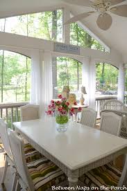 The table is called tirana rustic solid wood large dining table with extension. Double Bowl Hurricane Floral Centerpiece Pottery Barn Knock Off Between Naps On The Porch