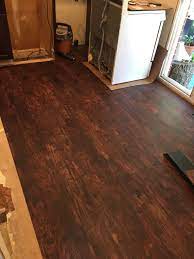 Java Hickory Luxury Vinyl Planks Not Really Reddish Must Have Been The Lighting Luxury Vinyl Plank Vinyl Plank Flooring Hickory Flooring