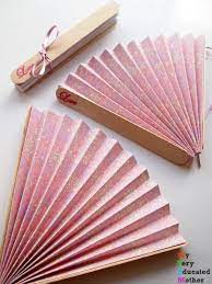 Your Wedding Guests Will Love These Fans Diy Wedding Crafts Summertime Diy Paper Fans Wedding Paper Fans Wedding Wedding Fans