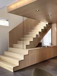 Floating stairs with a clear glass railing lead the way to the home's second level. Turn Your Old Staircase Into A Decorative Piece Pouted Com Stairs Design Modern Interior Staircase Modern Staircase