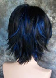 Slicked back short undercut hairstyle. Short Black Hairstyle With Blue Hair Color Highlight Celebrity Hairstyles Blue Hair Highlights Hair Styles Black Hair With Blue Highlights