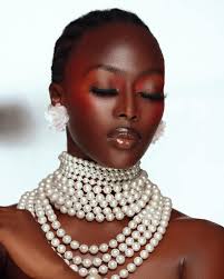 Would it be possible for someone to professionally retouch this photo of my  dad and me, enhancing the quality and background, as it's a precious memory  please and thank you.