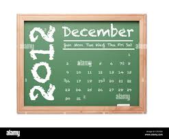 Month Of December 2012 Calendar On Green Chalkboard Over White Background Stock Photo Alamy