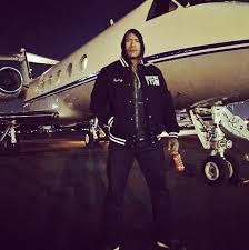 The Rock Posed In Front Of A Plane The Rock Dwayne Johnson Dwayne Johnson Dwayne The Rock