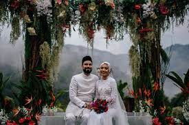 The lush venue in bentong, pahang contributed to a memorable day of outdoor romance. Showbiz Yuna And Adam Sinclair Tie The Knot