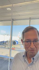 I’m boarding a British Airways flight for London, then Nairobi, Kenya