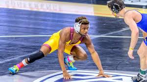 Michigan's cameron amine (left) pounces on rutgers brett what: 2021 Ncaa Championships At Large Selections Announced Flowrestling