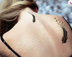 Feathers of different birds (eagle, peacock, phoenix) will represent different meanings. Feather Bird Tattoo On Girl Back Parryz Com