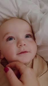 Intimate Hand Details: Red Nails and Turquoise Ring