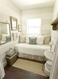 When the guest leaves, simply fold the bed back into the wall to reveal the bookshelf again. Small Yet Cozy Guest Bedroom Ideas Small Guest Bedroom Small Guest Room Guest Bedrooms