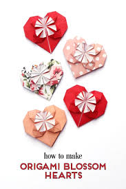 Creating chains of paper hearts. How To Make Origami Blossom Hearts Gathering Beauty