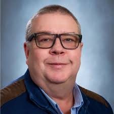 The smile of a proud mother, especially when she says “Mom, I'm following  your example.” Chemistry with minors in forensics and business. It finally  came in the mail so another celebration was