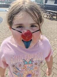 The colours of autism. Rudolph the blue tongued reindeer 🤣 Tilly wears  this nose anywhere