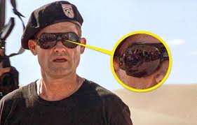 It was directed by roland emmerich , written by emmerich and dean devlin and starred kurt russell. You Can See The Reflection Of The Film Crew In Kurt Russell S Sunglasses Stargate Sg 1 Moviemistakes